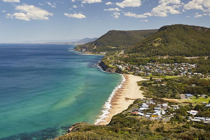 Private Tour: Sydney South Coast & Highlands - Wattamolla combines beach, lagoon, and waterfall