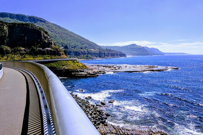 Private Wildlife Waterfalls and Wine Day Tour from Sydney - Crossing Sea Cliff Bridge on the Grand Pacific Drive