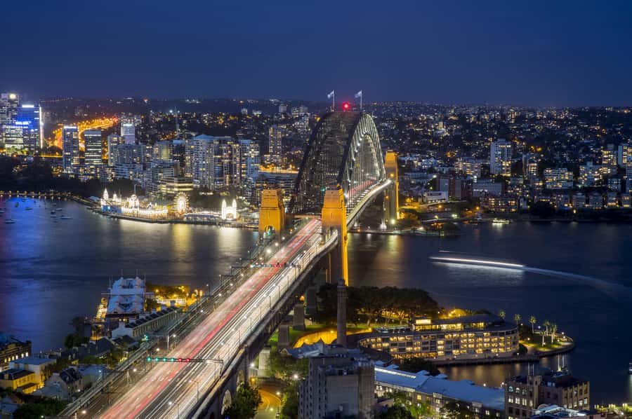Sydney: Big Bus Panoramic Night Tour by Open-Top Bus - Crossing the Harbour Bridge after dark