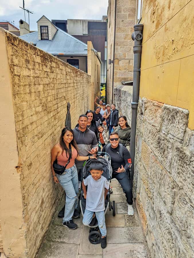 Sydney: City & The Rocks 3.5-Hour Walking Tour with a Drink - Entering The Rocks with more than a postcard view