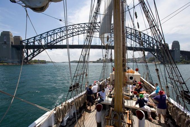Sydney Harbour Tall Ship Afternoon Discovery Cruise - Passing the Harbour Bridge and Opera House