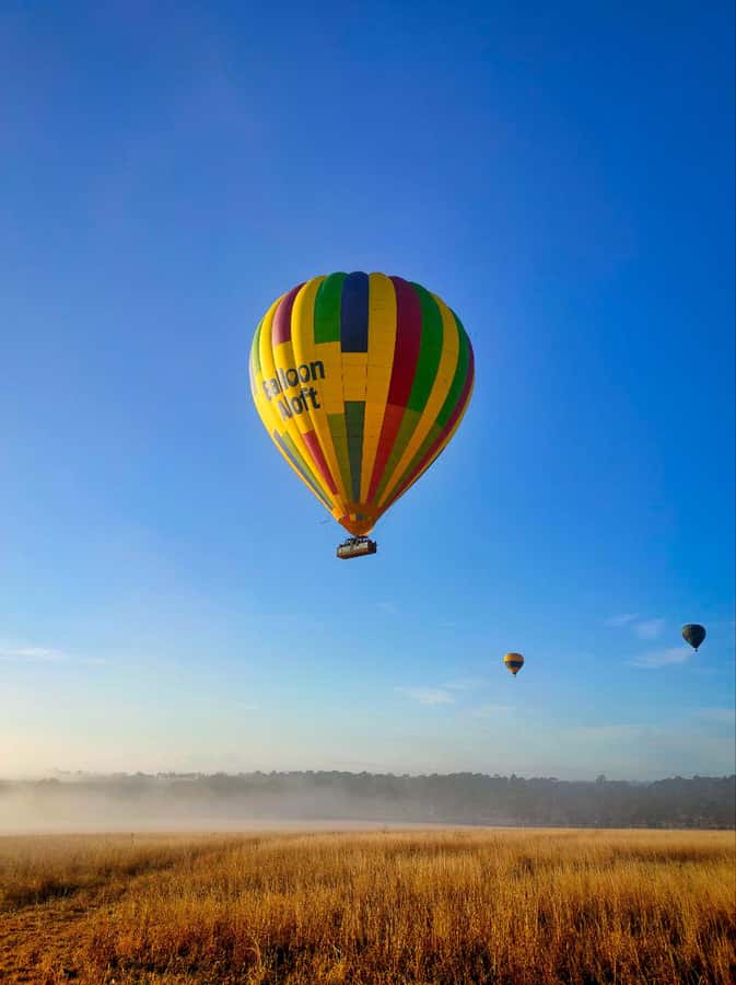 Sydney: Hunter Valley Sunrise Balloon Flight with Transfer - Preparing the balloon before takeoff