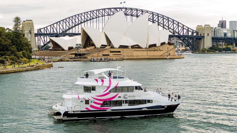 Sydney: Sydney Harbor Lunch Cruise with Welcome Drink - From Darling Harbour toward the Harbour Bridge