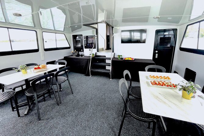 Vivid 90-Minute Sydney Harbour Intimate Catamaran Cruise with Canapes - Sydney Harbour Bridge: the first major view
