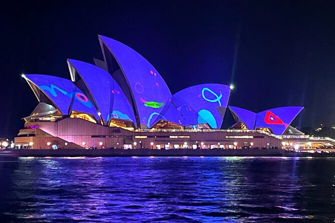 Vivid 90-Minute Sydney Harbour Intimate Catamaran Cruise with Canapes - Circular Quay and the city lights